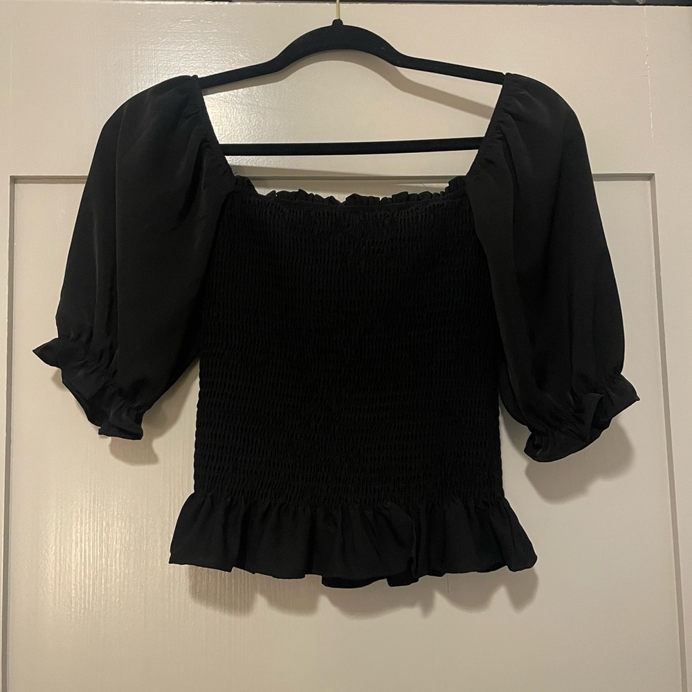 NEW black top

Ruched bodice